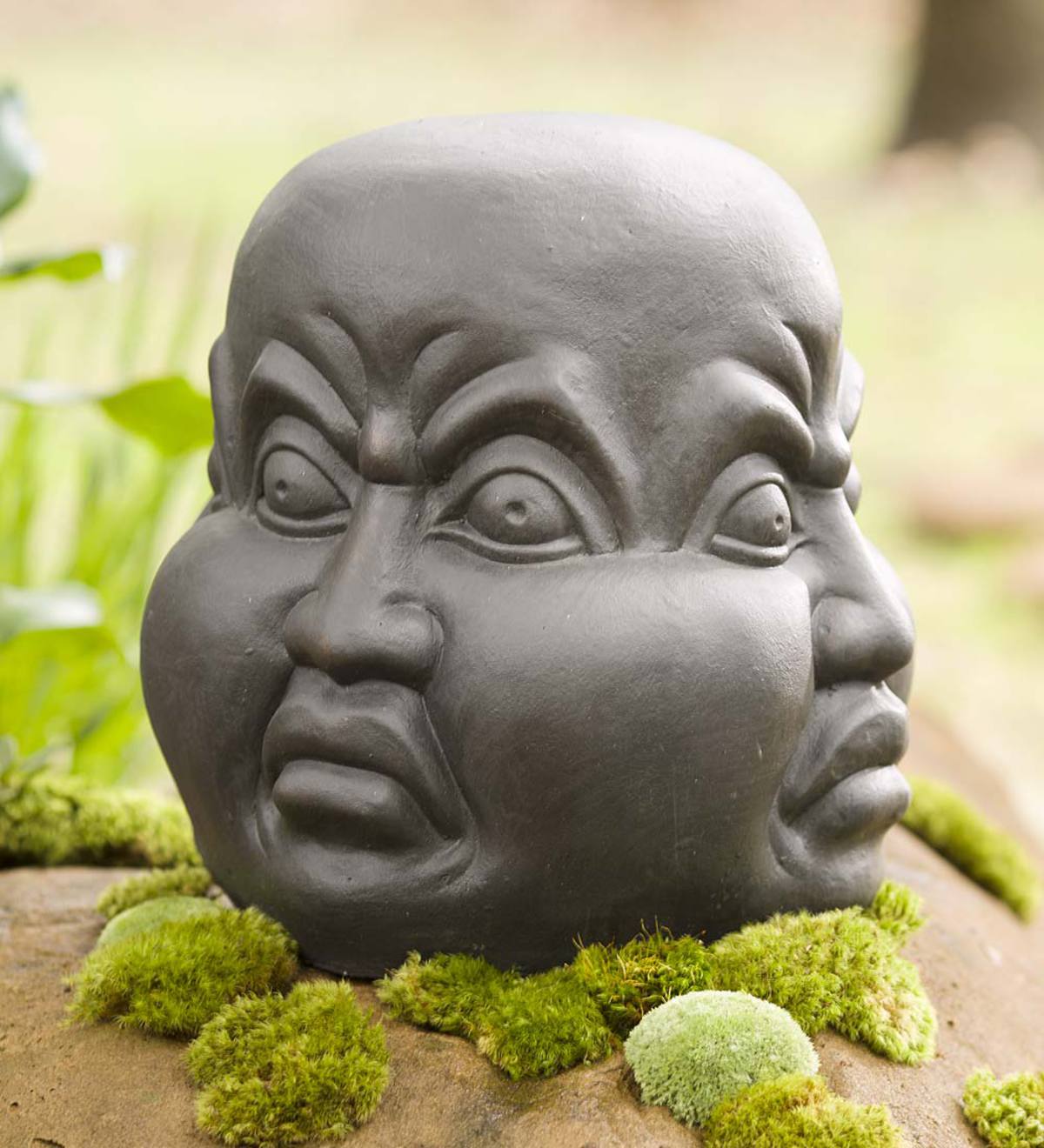 Four-Sided Angry Head Sculpture