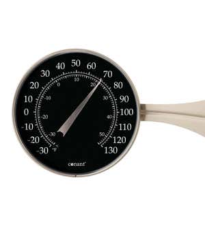 Large round analog thermometer hanging from bracket on outside wall Stock  Photo - Alamy