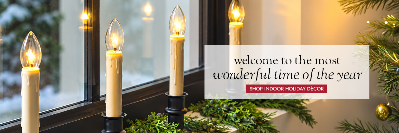 Image of Adjustable Window Hugger Candles, Set of 4 with Remote. welcome to the most wonderful time of the year. SHOP INDOOR HOLIDAY DECOR