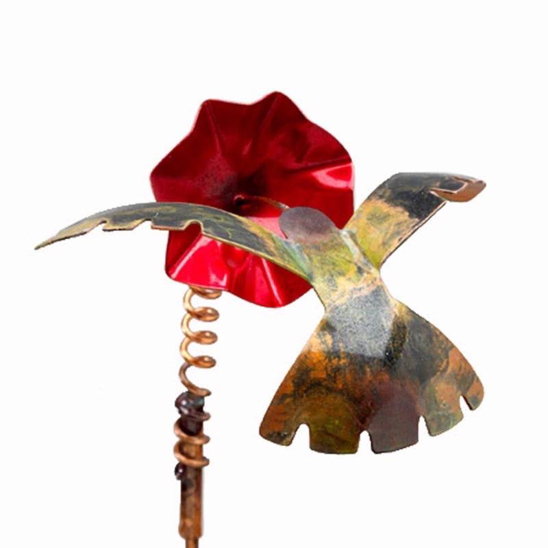 Colorful Copper Hummingbird With Flower