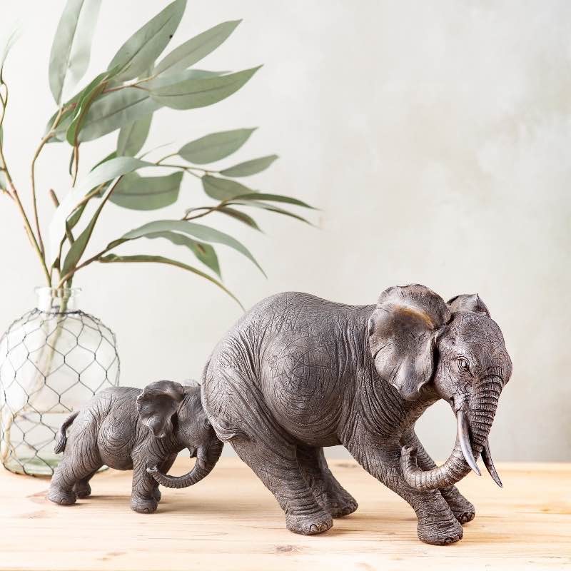 Baby Elephant Pushing Mama Elephant Tabletop Sculpture