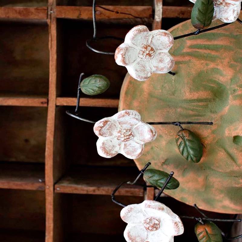 Windblown Sun Face with Dogwood Flowers Wall Art