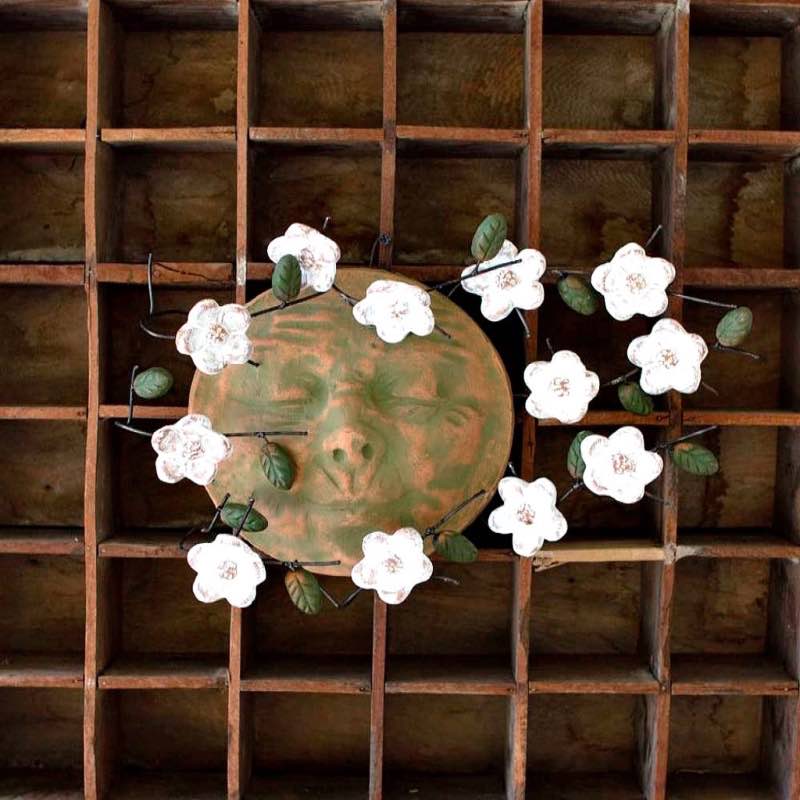 Windblown Sun Face with Dogwood Flowers Wall Art