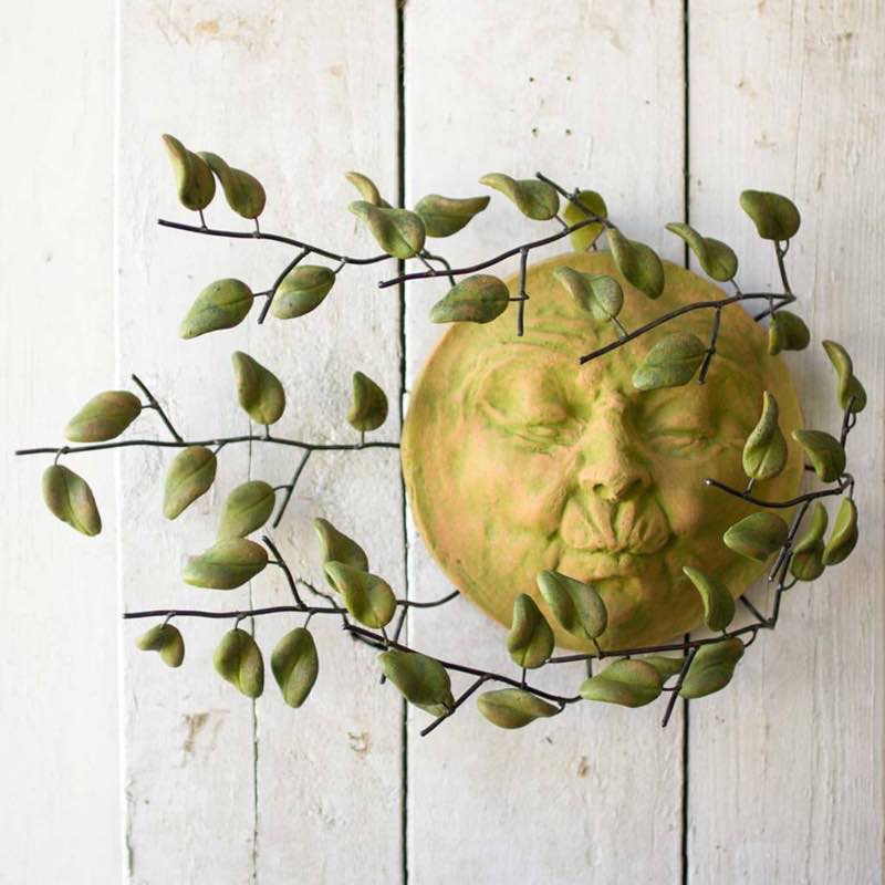 Sun Face with Blowing Leaves Wall Art